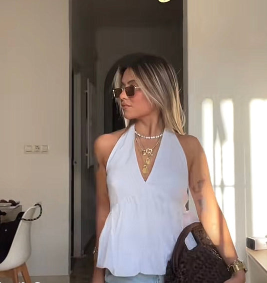 TOP VOLANTE
